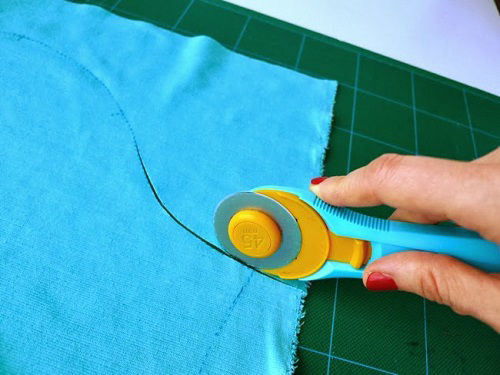 Cut knit fabric with regular fabric scissors, or a rotary cutter will give you an even more accurate result